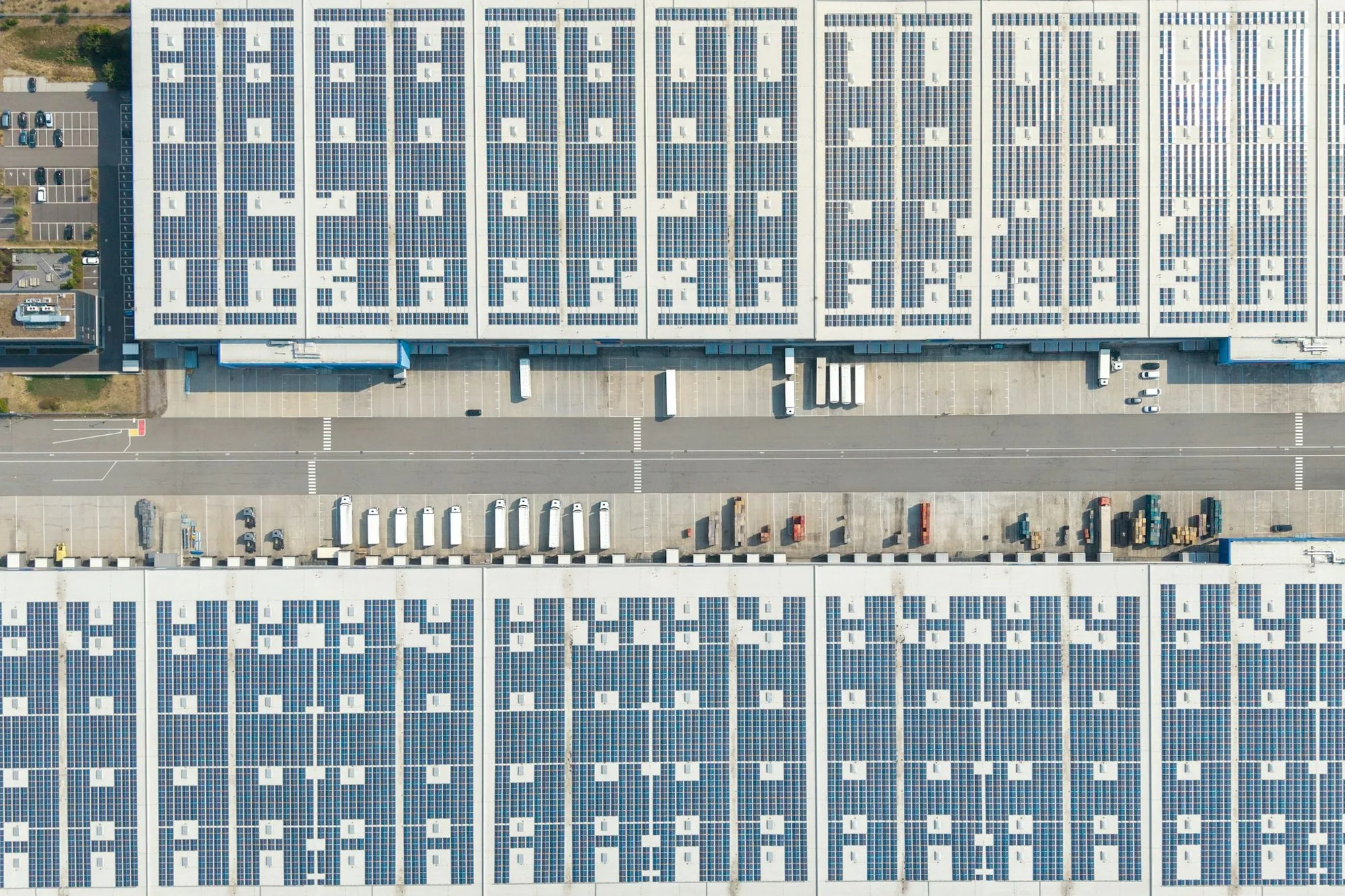 Rows of solar panels on a commercial roof