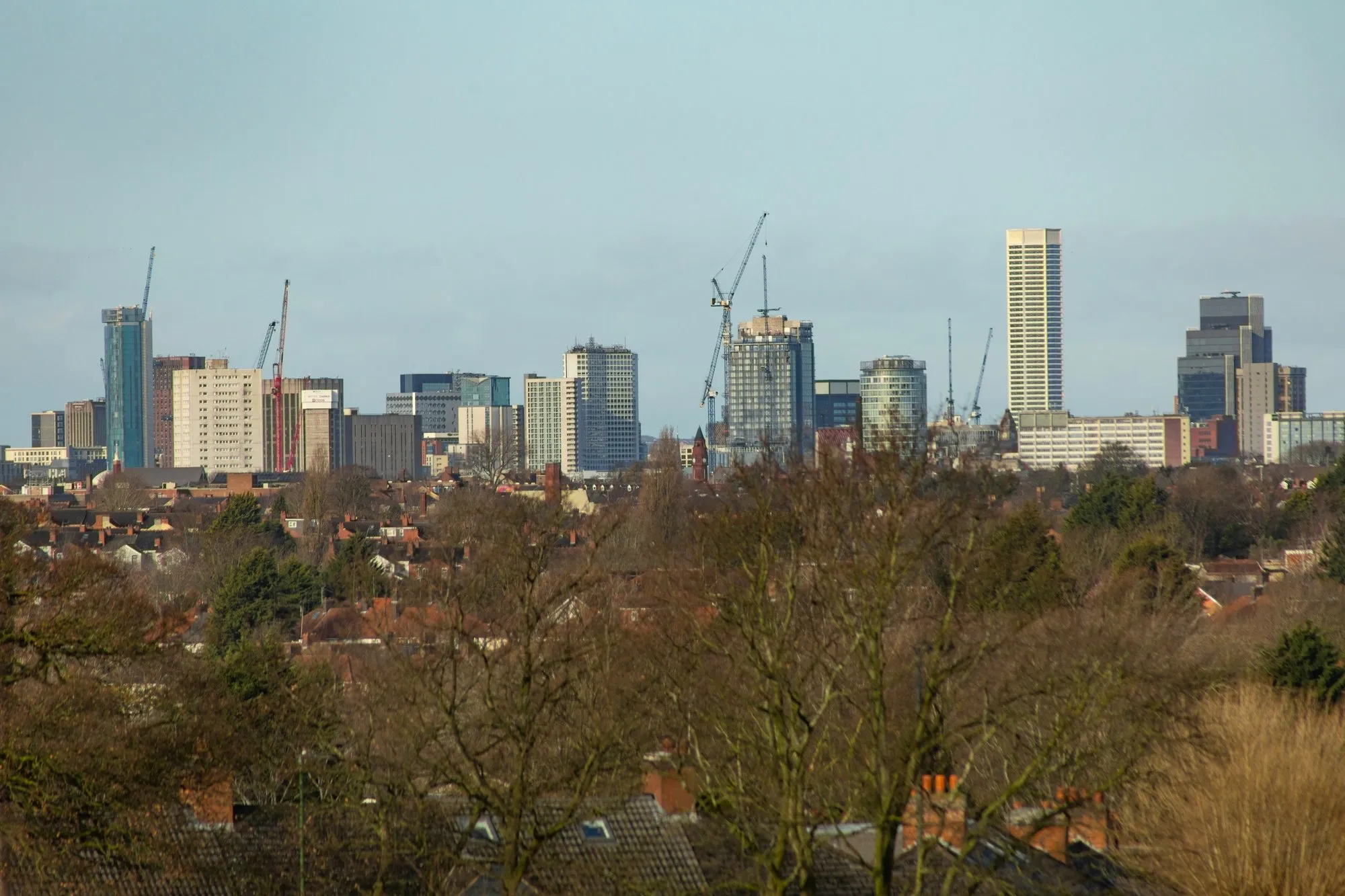 Birmingham city centre skyline with cranes above new towers