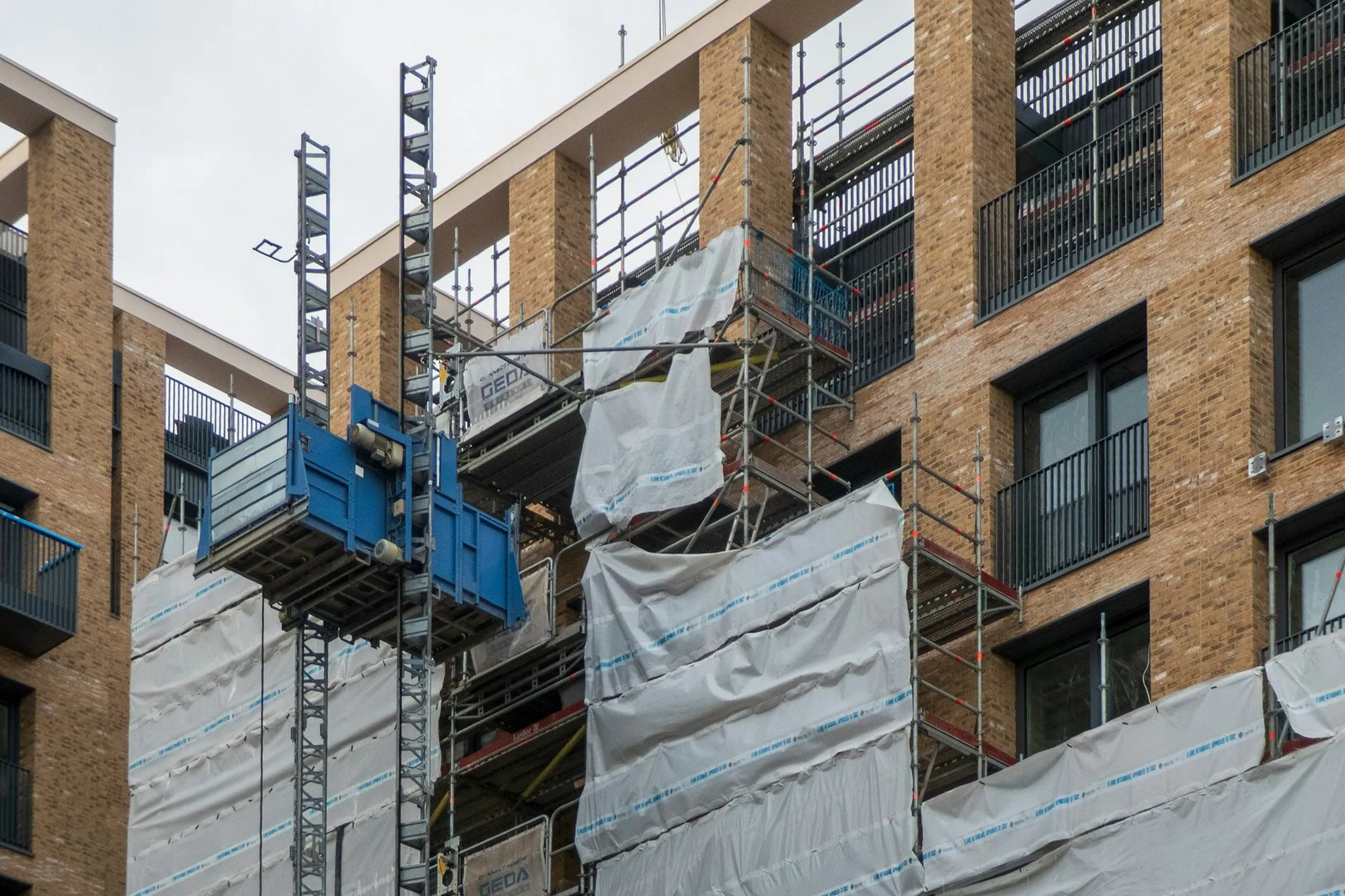 Fire stopping and cladding remediation for occupied residential blocks