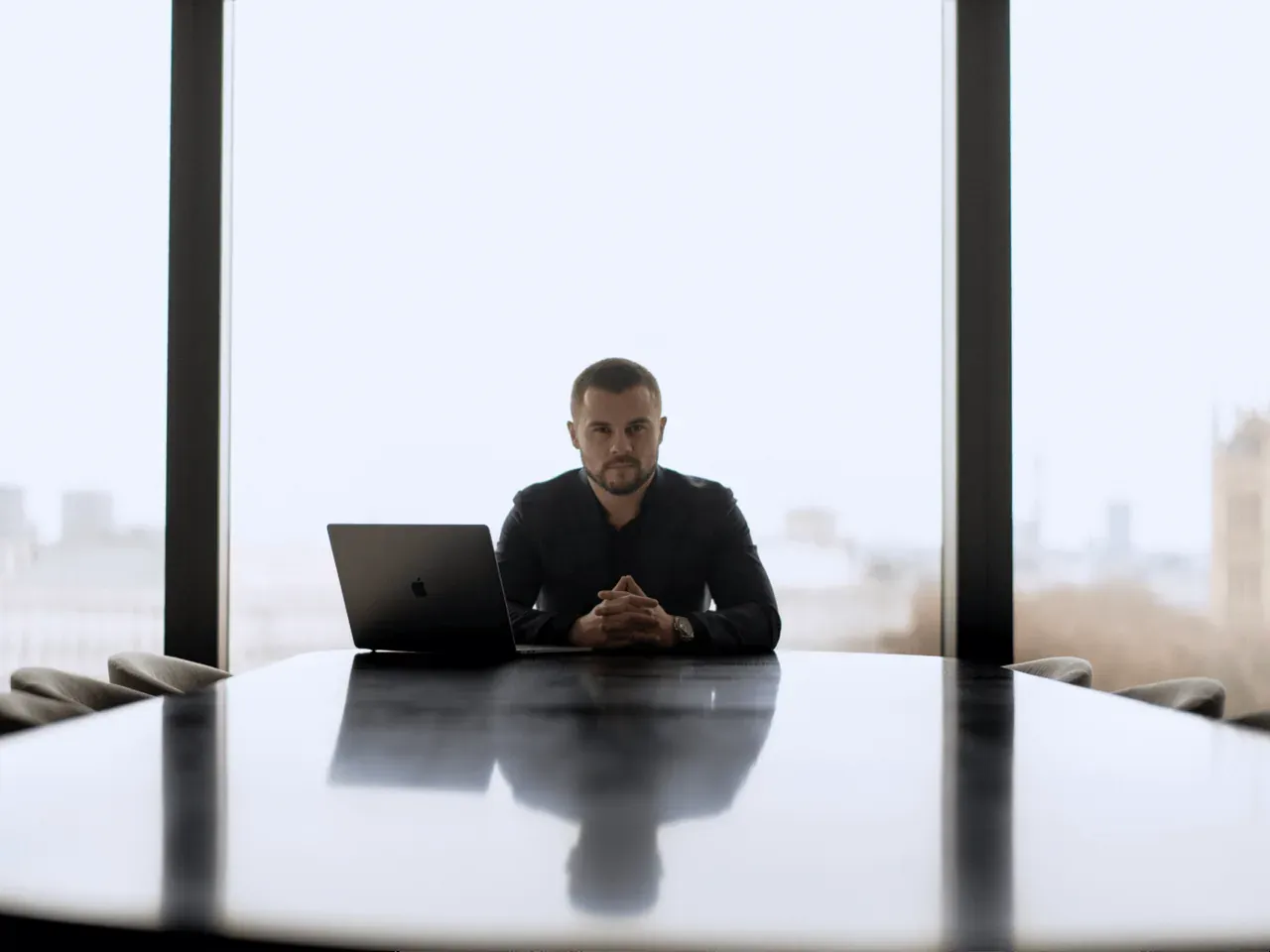 Sviat Jay, Craftex CEO, at a meeting table with a laptop