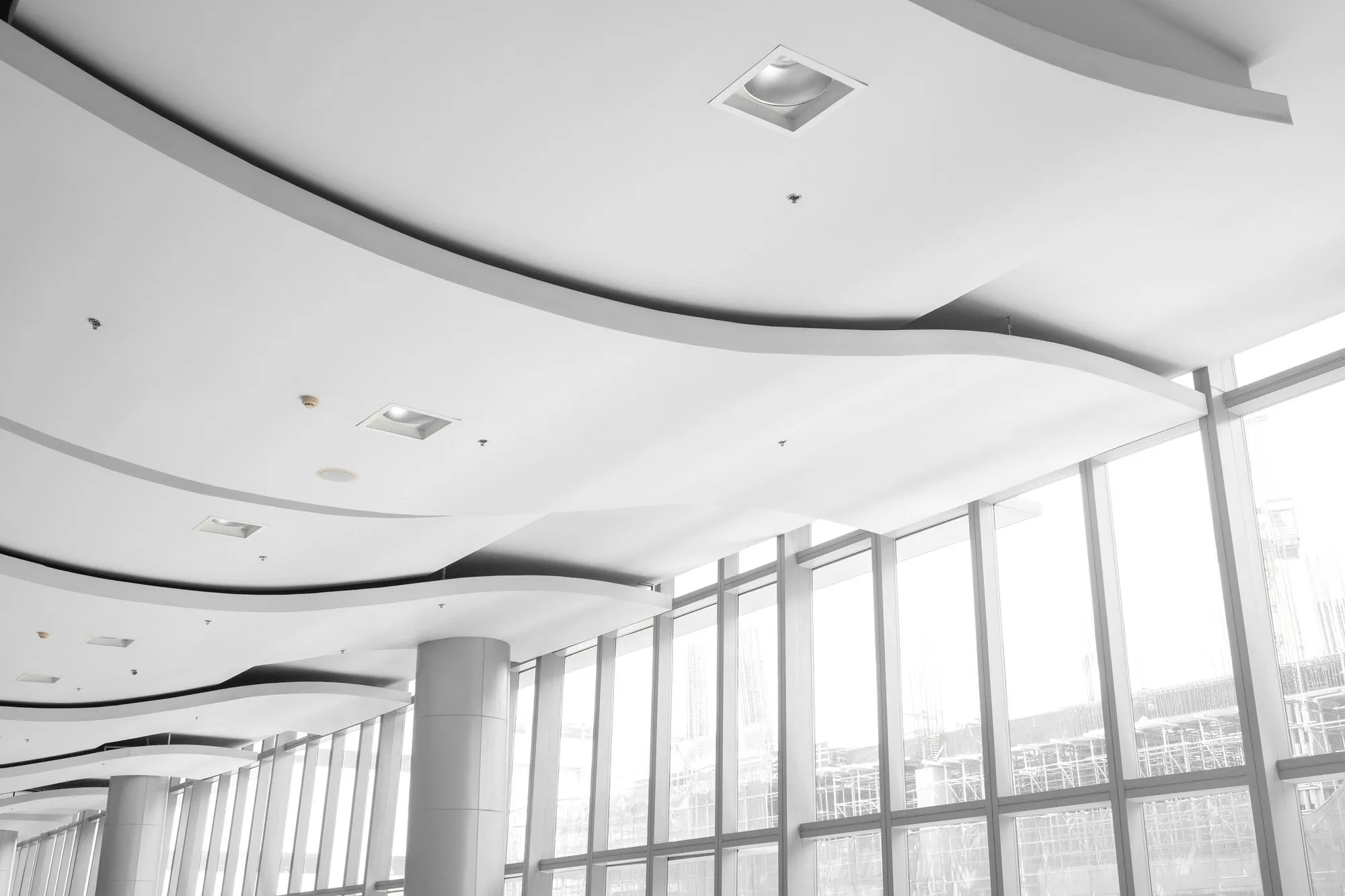 Ceiling with recessed lighting and air diffuser in a new office