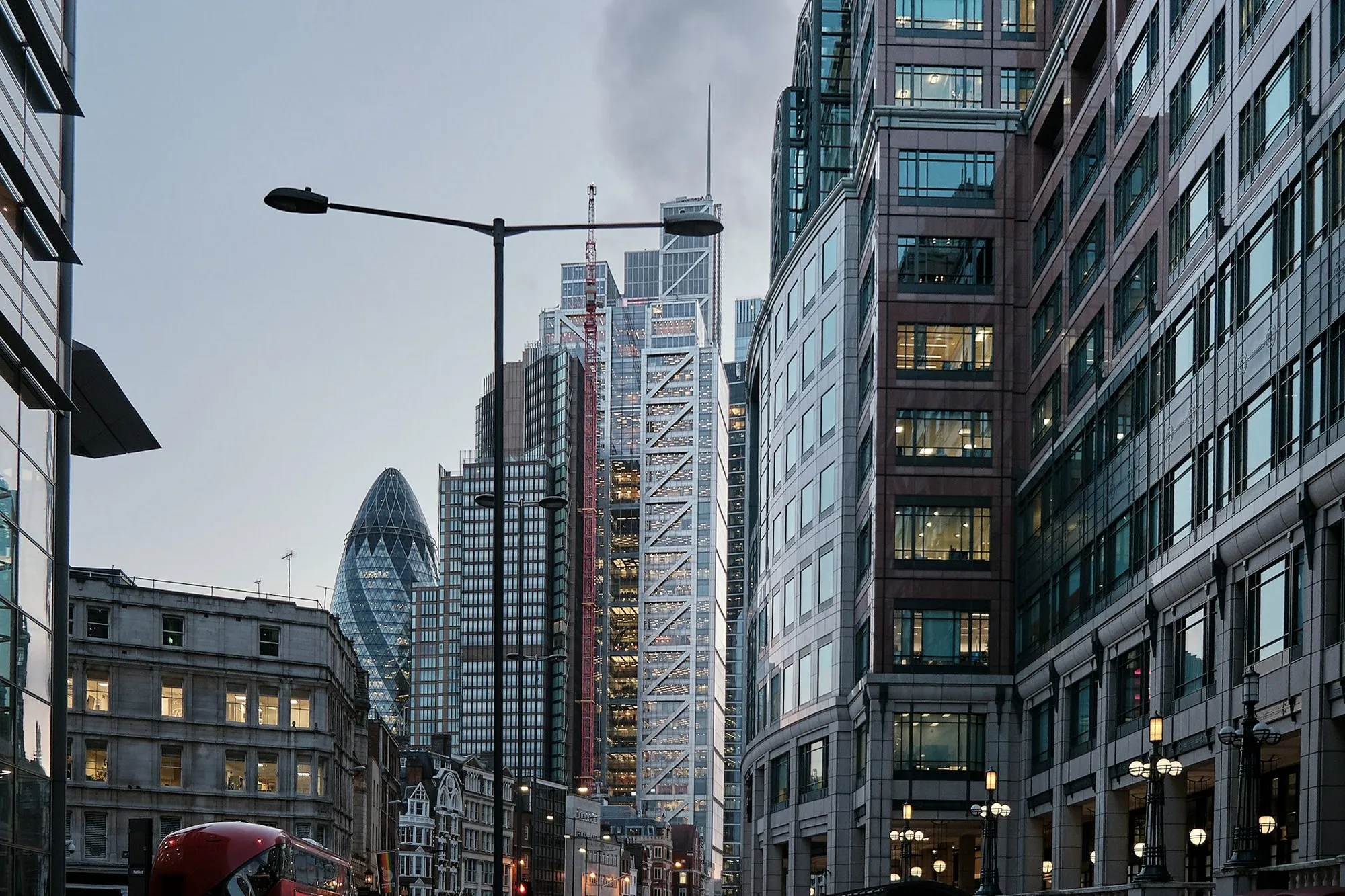 City of London office blocks with the Gherkin beyond, seen from the street