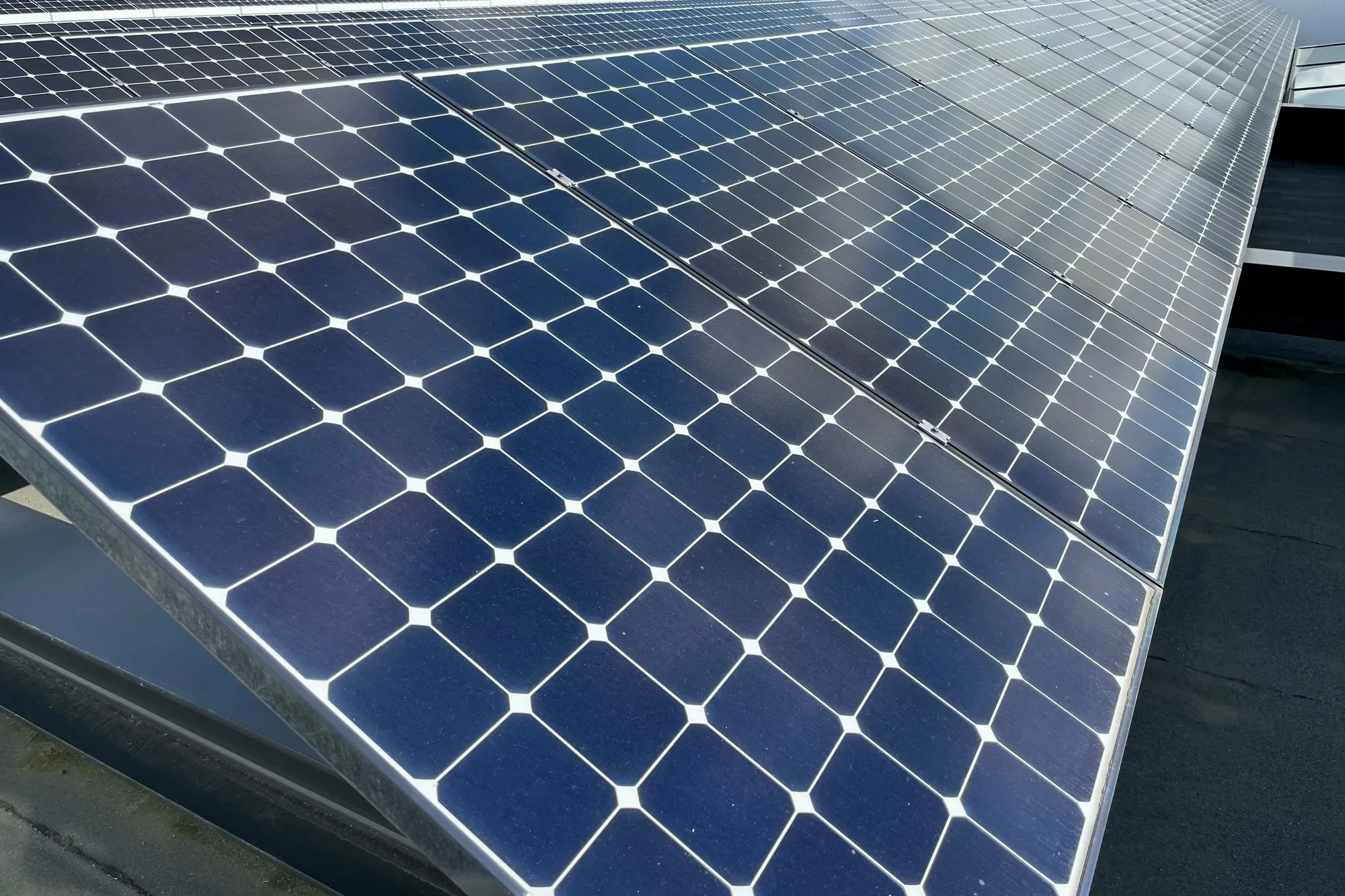 Close view of solar panel cells on a roof