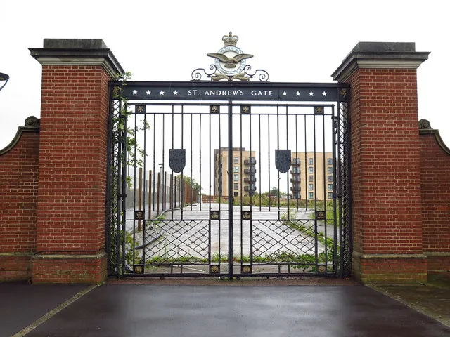 St Andrew's Gate, the former entrance to RAF Uxbridge, with new homes beyond, 2019
