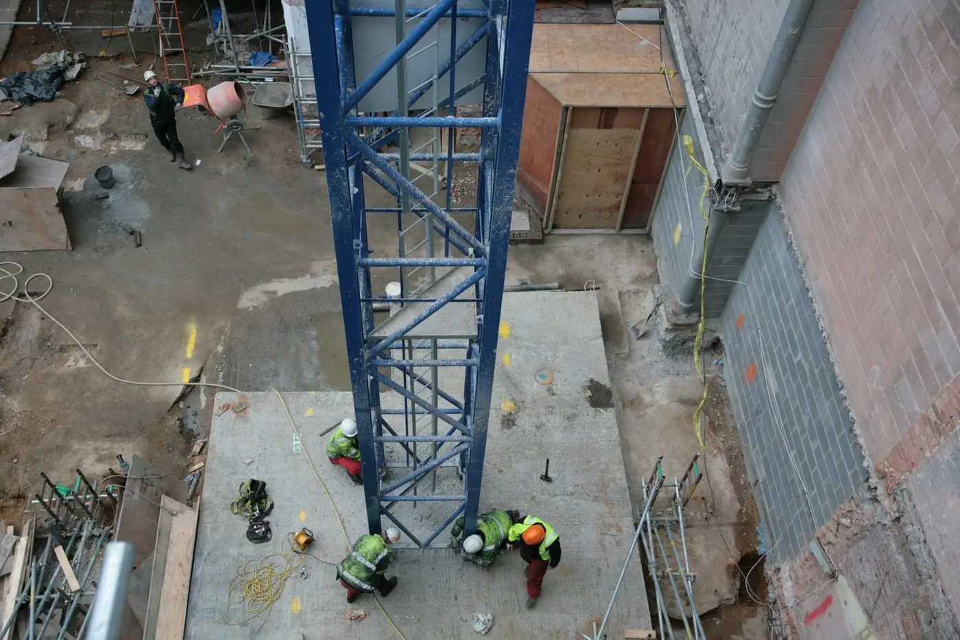 Basement works around a tower-crane mast on a London construction site