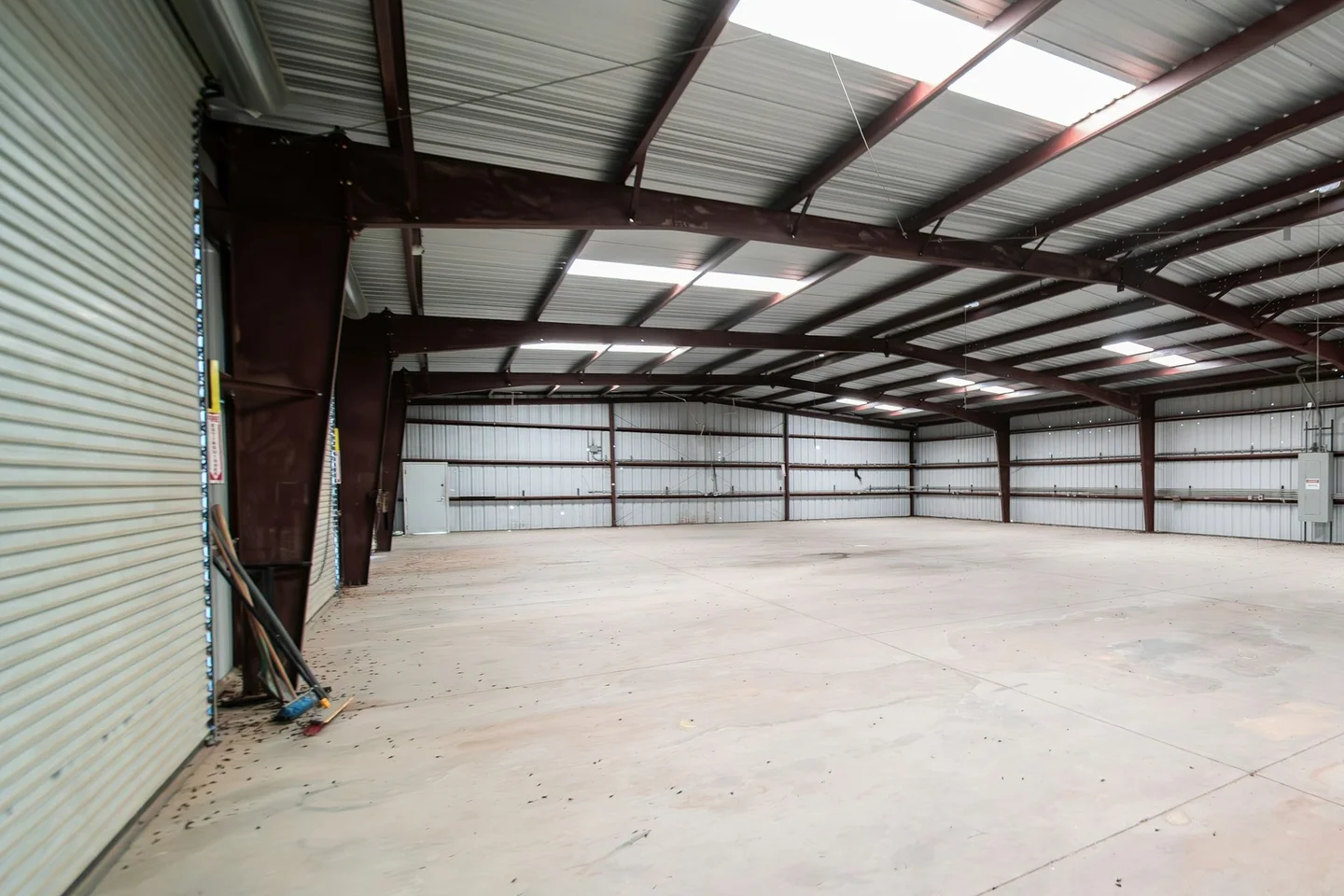 Warehouse refurbishment in Glasgow: empty steel-framed unit ready for fit-out